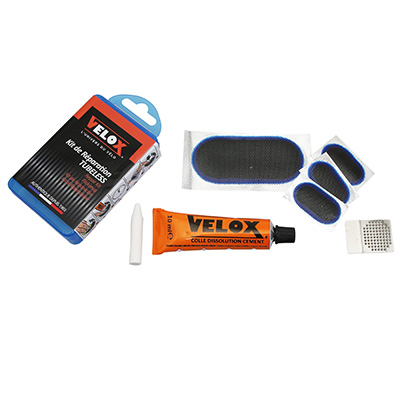 KIT REPARATION PNEU TUBELESS VTT - GRAVEL VELOX PAR L'INTERIEUR AVEC RUSTINES - BOITE (3 PATCHS 32X16MM + 1 PATCH 75X35MM + COLLE 10G + RAPE ACIER) AVEC NOTICE